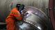 Reactive metal heat exchanger manufactured using exotic metal fabrication